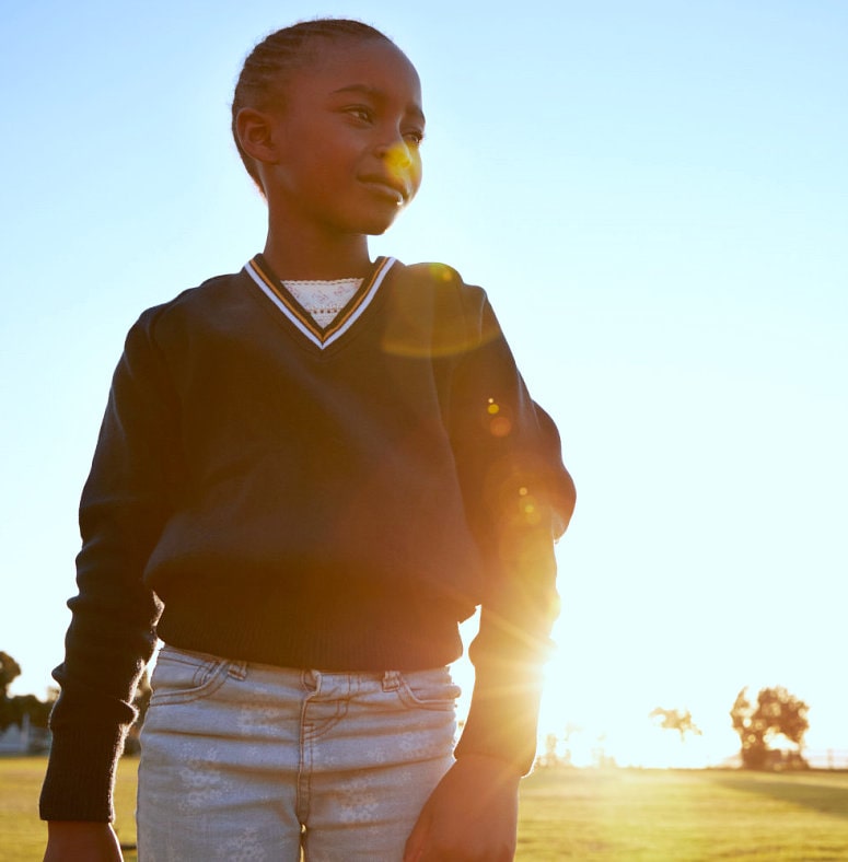 kid showing looking far away