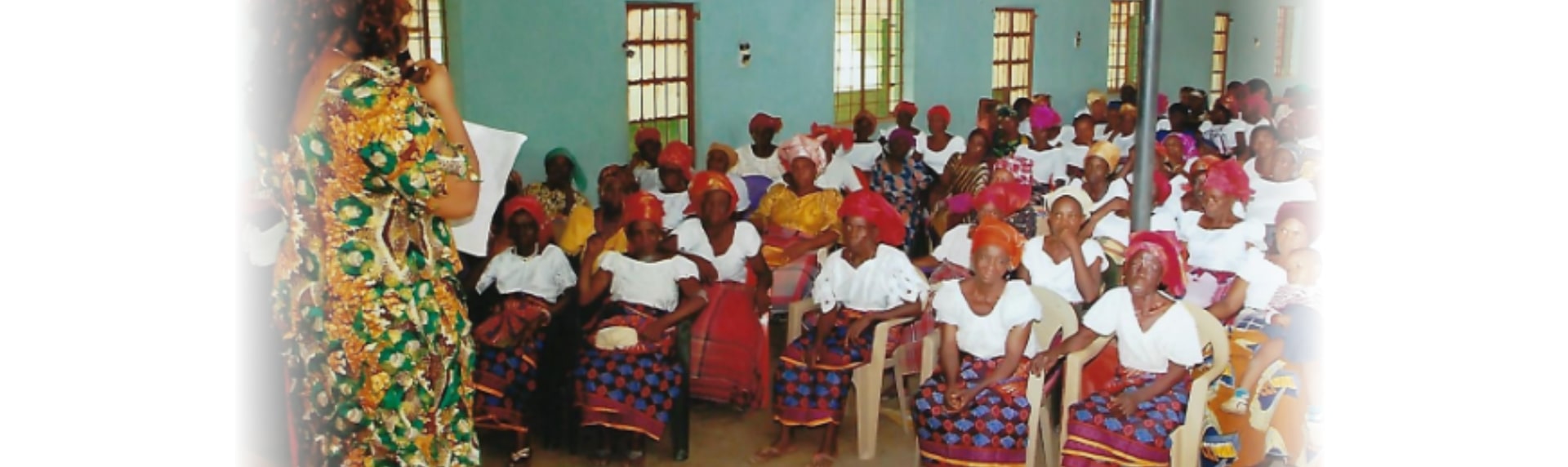 group of women sitting in a room