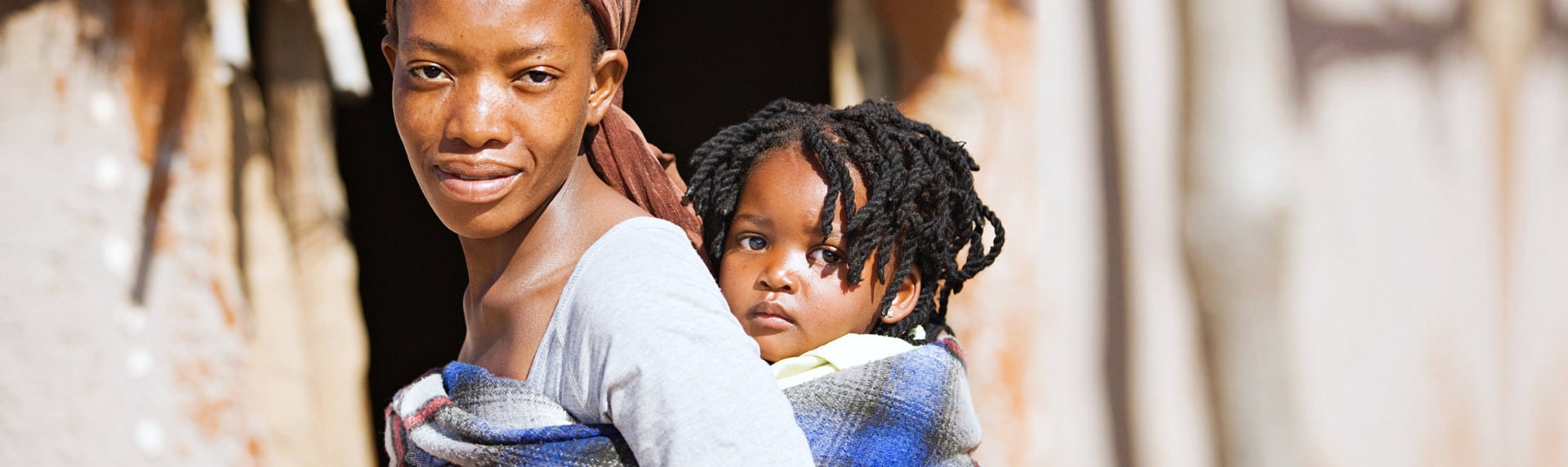 mother and daughter looking at the camera